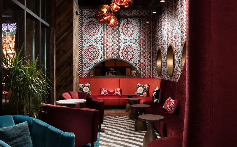 Secluded group lounge area inside Puttery, with relaxing ambiance.