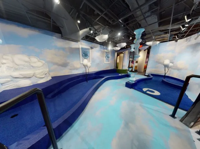 cloudy sky themed mini golf course