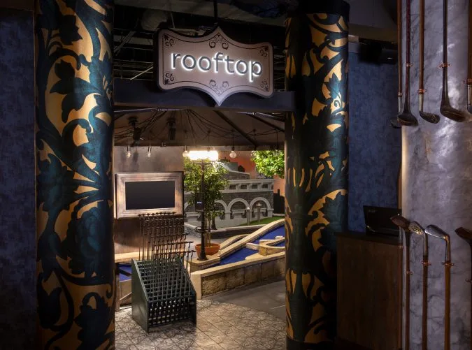 entrance to city rooftop themed putt putt course