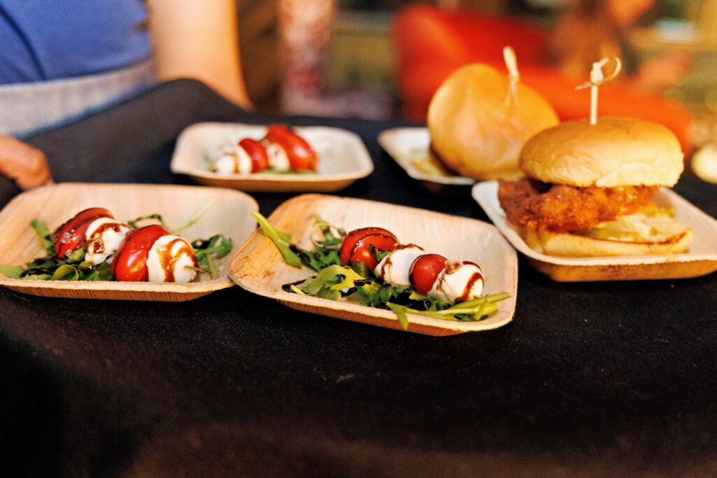 Puttery Event Food Set-up with Caprese Salad and Chicken Sandwiches